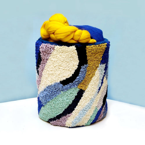 Ragged Life rug hooked laundry tub / storage basket in blue and yellow fabric strips