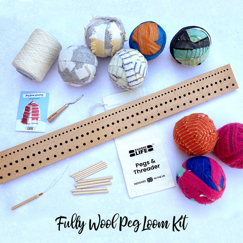 Ragged Life Fully Wool Peg Loom Kit with woollen fabric strips, 90cm wooden loom, cream strong warp, latch hook, threader, instruction booklet and kit bag. Makes an XL rag rug.