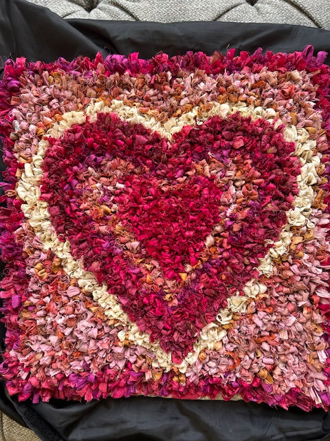 Heart design short shaggy cushion made using recycled sari silk ribbon