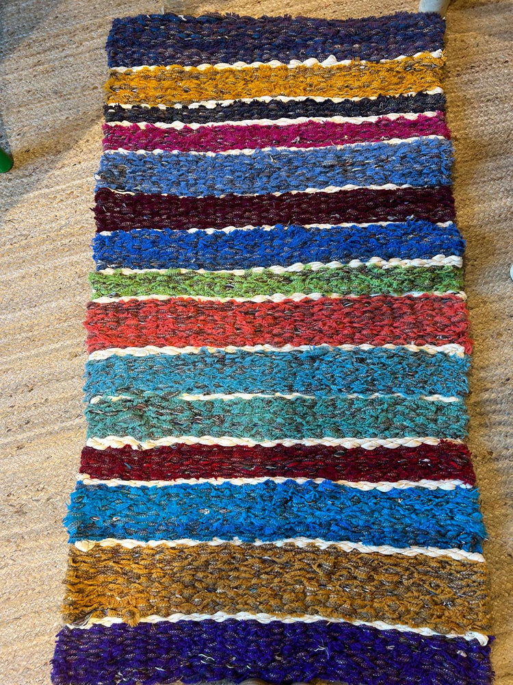 Beginners peg loom woven rag rug
