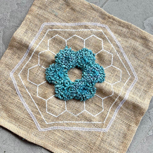 Rug hooked flower pattern in teal seafoam sari silk ribbon