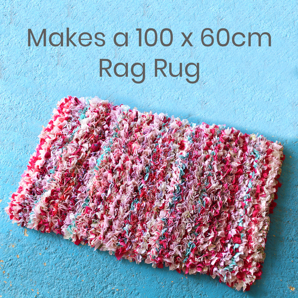 Pink striped rag rug made using old clothing and textile waste